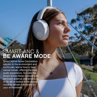 JLab JBuds Lux ANC headphones connected to iPhone