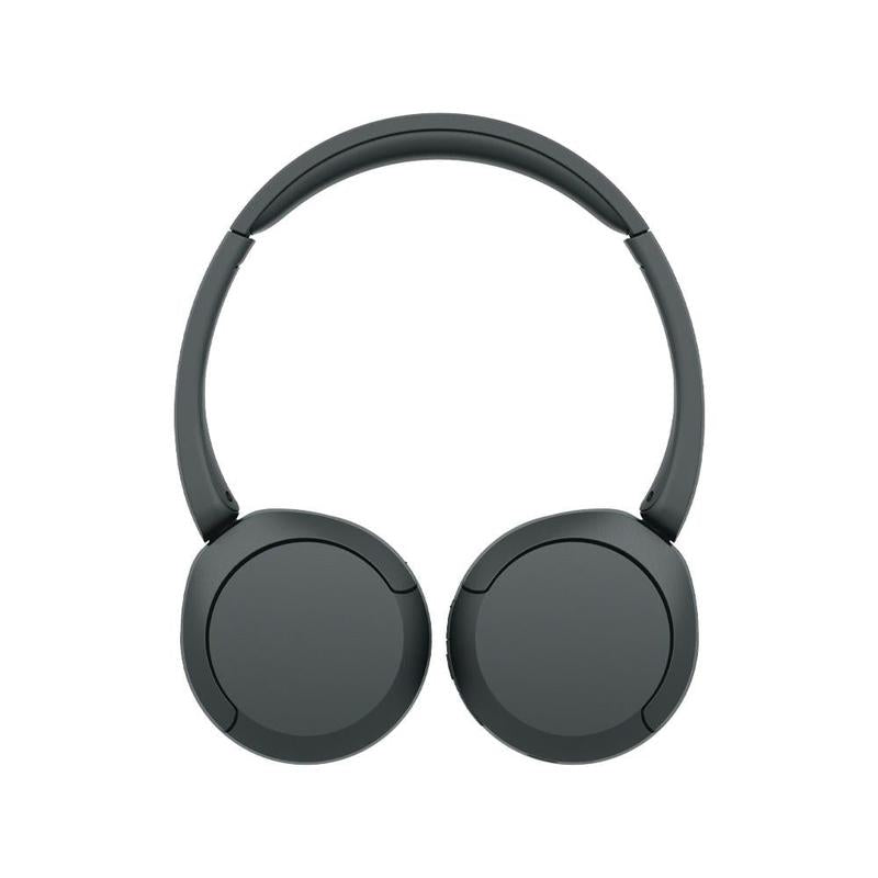 User wearing Sony WH-CH520 headphones during commute