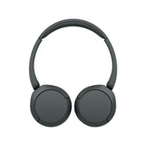 User wearing Sony WH-CH520 headphones during commute