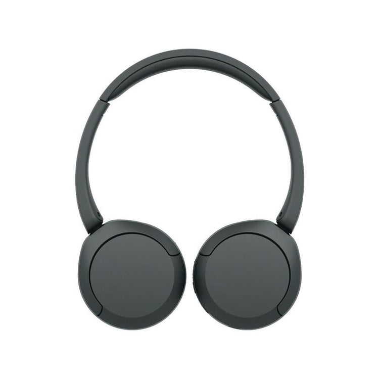 User wearing Sony WH-CH520 headphones during commute