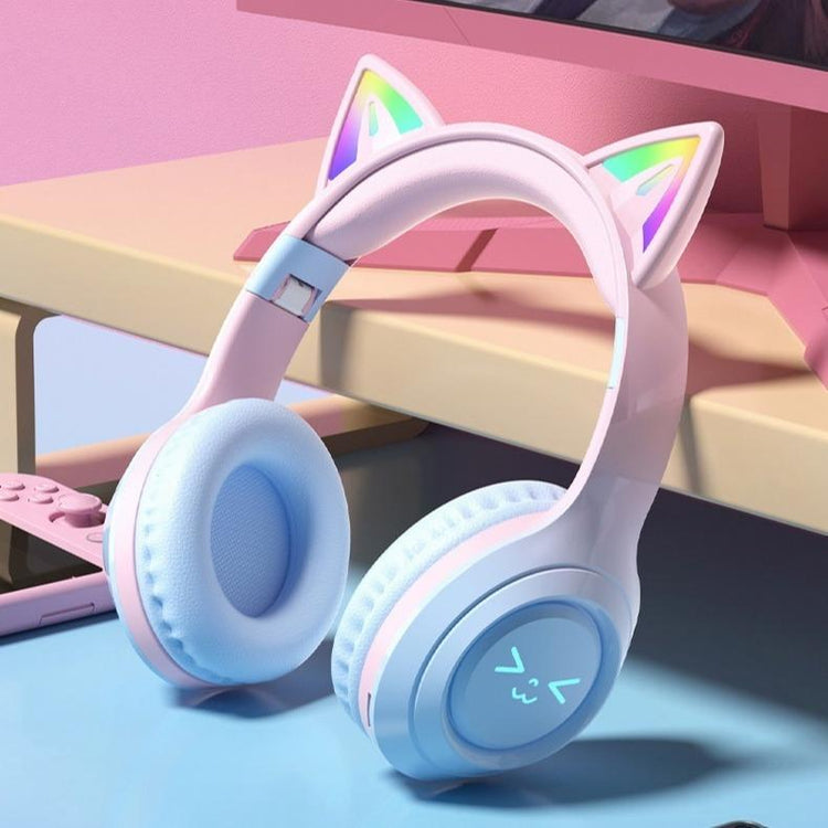 Cat Ear Bluetooth Headphones – LED Foldable Over-Ear with pink design and light-up ears on a table.