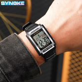 Retro Digital Sports Watch displaying time on wrist with stylish black strap and large LCD screen.