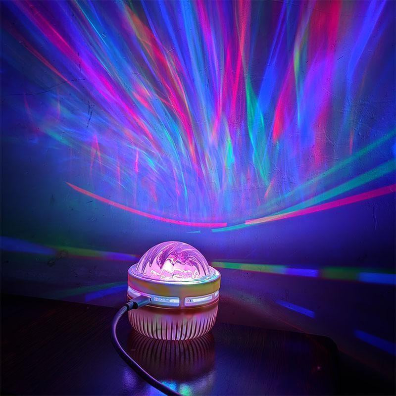 Black Hole Aurora Projector creating a water ripple effect and colorful northern lights ambiance on a wall.