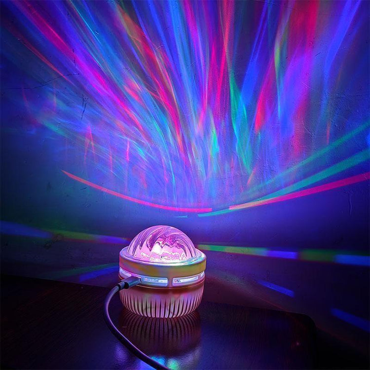 Black Hole Aurora Projector creating a water ripple effect and colorful northern lights ambiance on a wall.