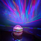 Black Hole Aurora Projector creating a water ripple effect and colorful northern lights ambiance on a wall.