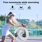 Air conduction headphones for sports worn by a female athlete playing tennis outdoors, showcasing free movements while exercising.
