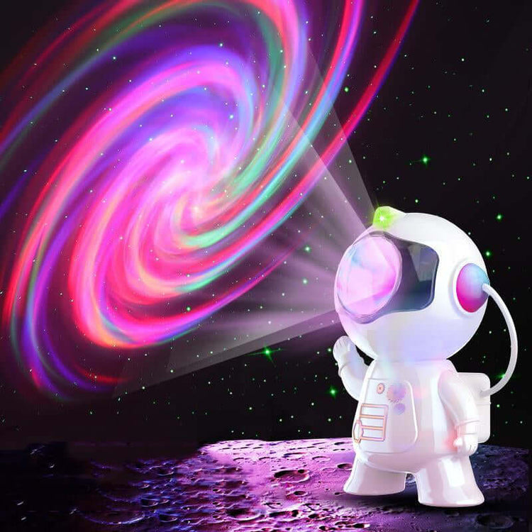 Astronaut Galaxy Projector displaying colorful stars and nebulae in a night sky setting