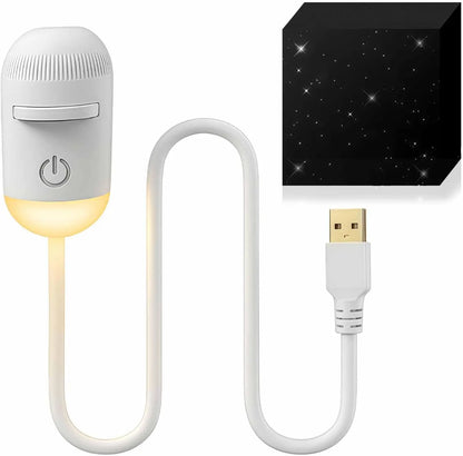 Studio product shot of the white capsule projector lamp with its flexible silicone gooseneck and USB plug.